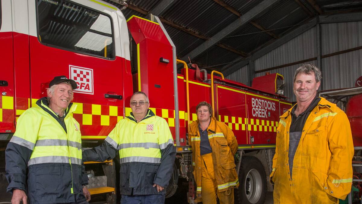 Quick to respond: Bostocks Creek CFA members Lance Robilliard, left, Leon Clark, Eddy Guthridge and David Hallyburton were among the hundreds of firefighters whose work helped prevent loss of life in the St Patrick's Day fires. Pictures: Christine Ansorge