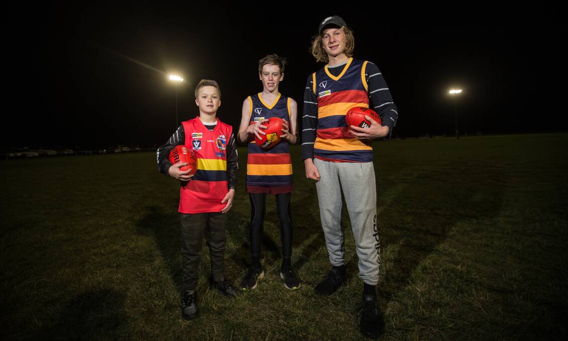 RISING STARS: Archie Parsons (under 12s), with captains Miles Picken (under 14s) and Ned Payne (under 16s) at the final training session on Wednesday night. Picture: Christine Ansorge