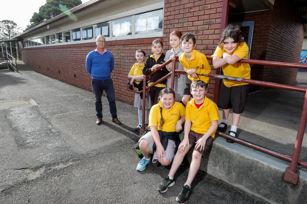 UPGRADES: Warrnambool Primary School vice principal Dean Clements with some of the grade 3 and 4 students currently using the D-Block building that is scheduled to be removed and replaced. Picture: Rob Gunstone
