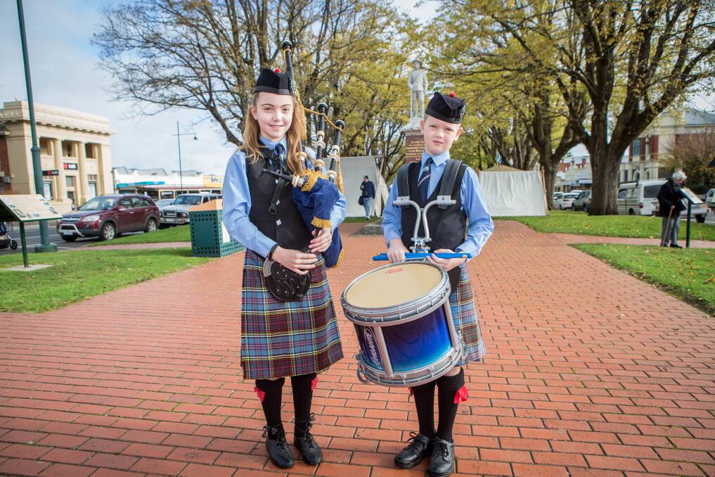 Pipes: Warrnambool and District Pipeband members Zahli Clark, 12, and Harry Clark, 10, prepare to play for visitors at the 2018 festival. 