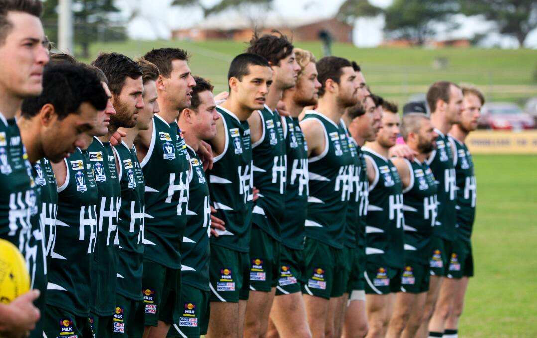 'DISAPPOINTING': Hampden players line up for the national anthem. League board member Gary Attrill has voiced his displeasure at AFL Victoria's move to scrap interleague. Picture: Rob Gunstone