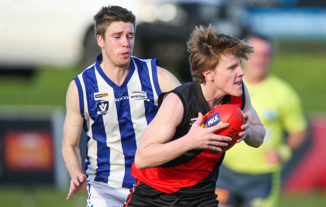 ON SONG: East Warrnambool's Caleb Templeton in action during the Bombers' round seven win over Russells Creek. Picture: Morgan Hancock .
