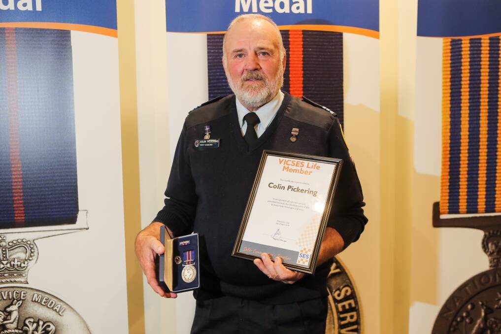 Honour: Colin Pickering was awarded a life membership at an SES event on Sunday. He first joined the SES following the devastating bushfires of 1977. Picture: Morgan Hancock .