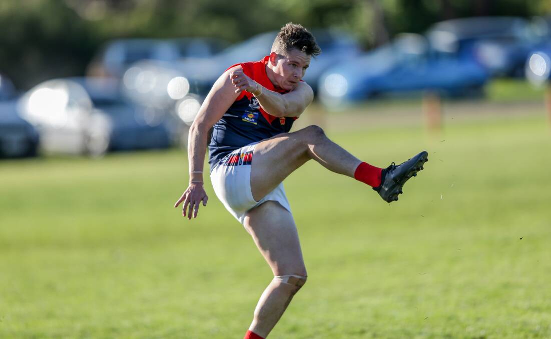 KICK: Simon Harkness is making a difference off half back for Timboon Demons. A trip to Reid Oval awaits his team today. Picture: Christine Ansorge