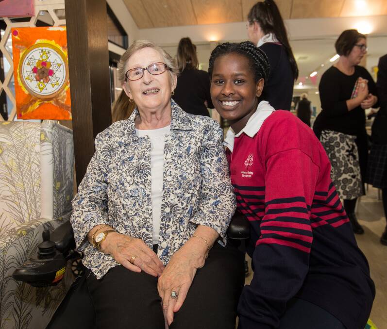 Comfort: Resident Janet West is thrilled with the blouse made for her by student Stella Nabong, 17. Picture: Christine Ansorge