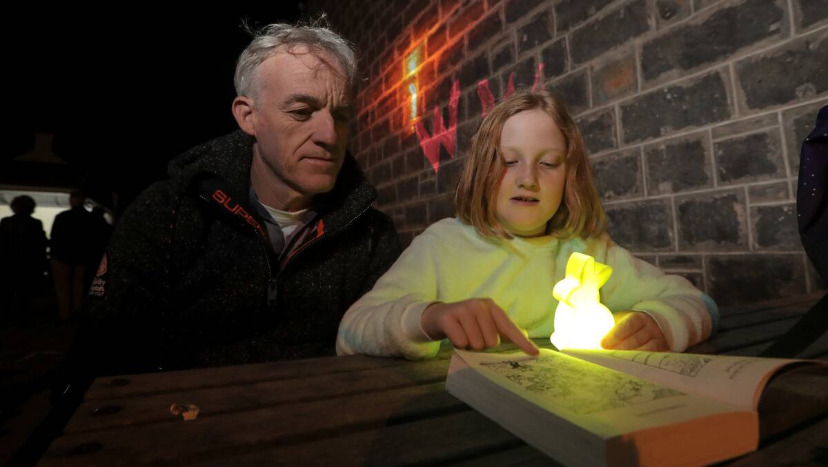 Planning: Port Fairy's Mark Winnen and daughter Heidi Winnen, 9, were making decisions aboutevents to attend at the start of the Winter Weekends. 