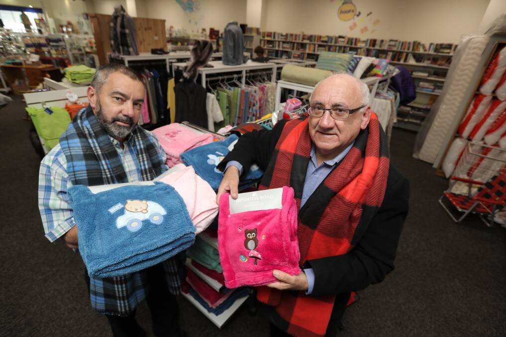 WINTER: St Vincent de Paul op shop store manager Kevin Bond and Glenelg Regional Council President Chris Pye are looking for more winter woolies that they can distribute to those in need this winter. Picture: Rob Gunstone