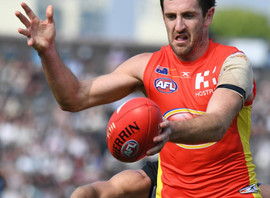 SUNSET: Michael Barlow spent two seasons at Gold Coast. He played his last AFL game in round 23, 2019, collecting 35 disposals. Picture: AAP Image/Tracey Nearmy