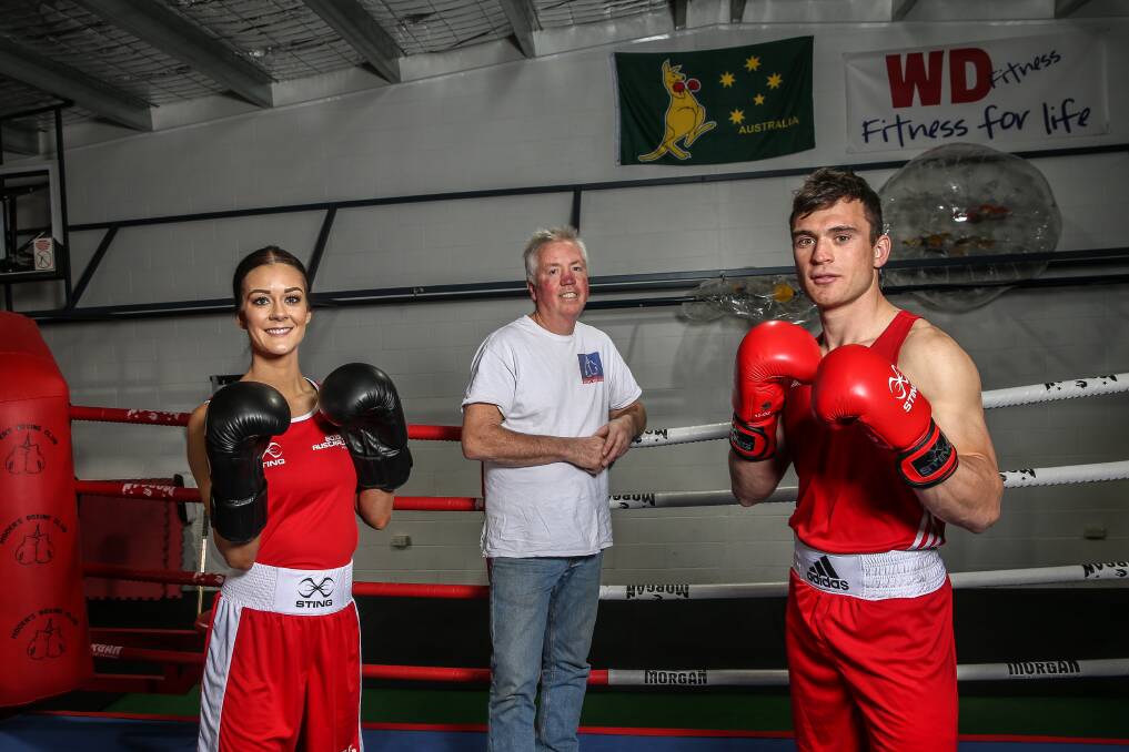 Triple threat: Mocka's Boxing Club trio Katie Barker, coach Ray 'Mocka' McIntosh and Jayden Riddle are a winning combination. Picture: Christine Ansorge