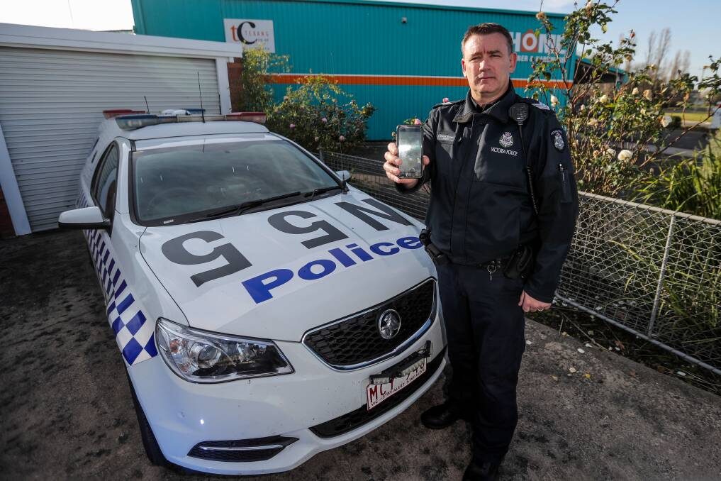 RING RING: Sergeant Danny Brown says a new 24 hour assistance line will bring faster results to reports of non-urgent crimes. Picture: Morgan Hancock