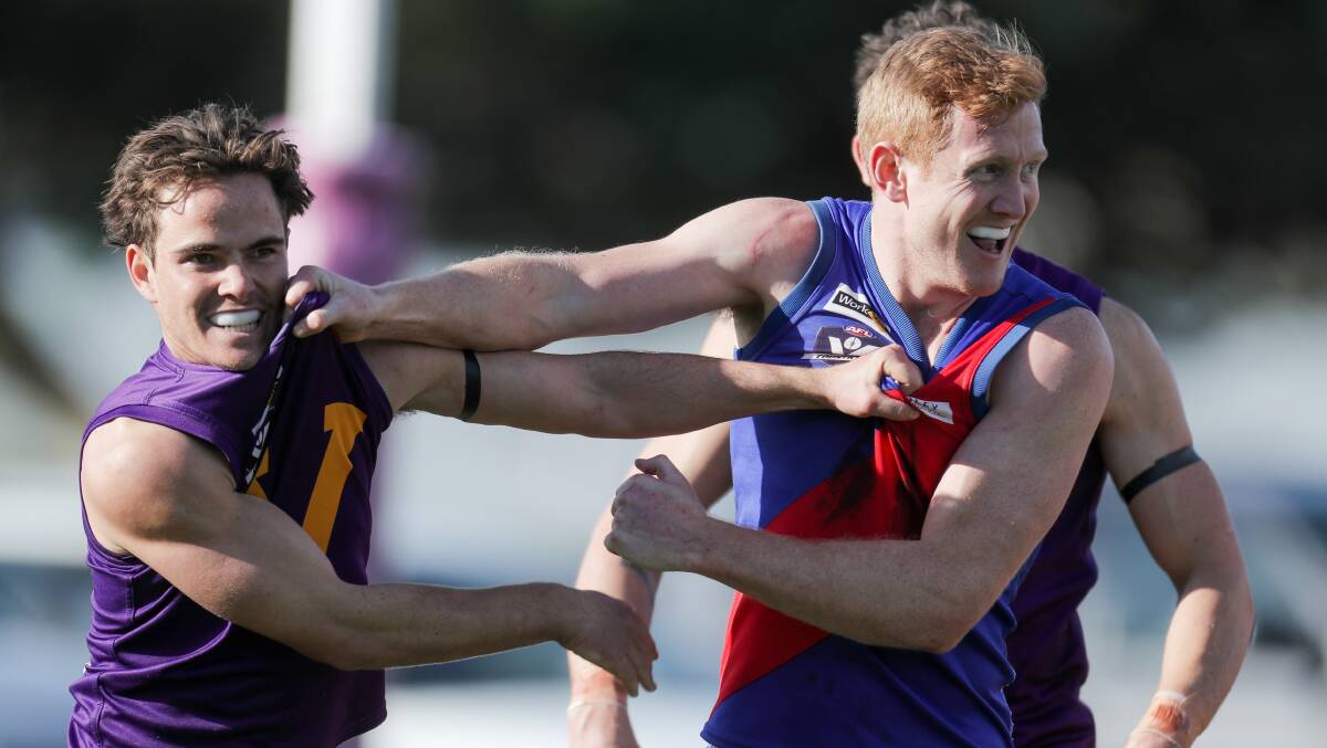 IN THE THICK OF IT: Tyler Hetherington of Port Fairy and Jordie McKenzie of Terang Mortlake make contact with one another. Picture: Morgan Hancock .