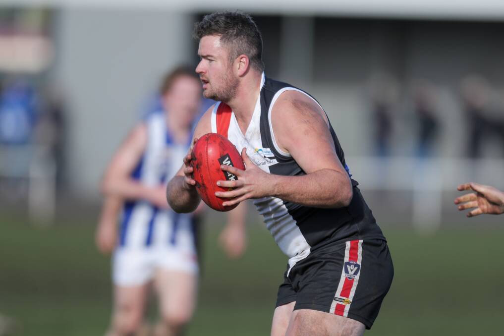 RED, WHITE AND BACK: Daniel Roache returned to Koroit this season after time at Panmure and Hawkesdale-Macarthur. Picture: Morgan Hancock