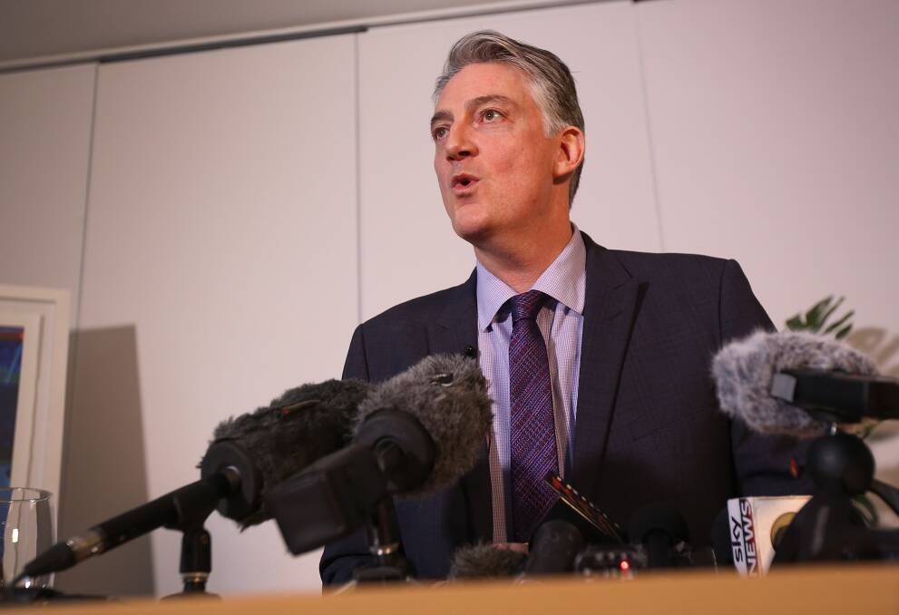 DARK DAY FOR THE SPORT: Basketball Australia chief executive Anthony Moore speaks to the media in Brisbane to address the FIBA World Cup qualifier brawl in the Philippines. Picture: AAP