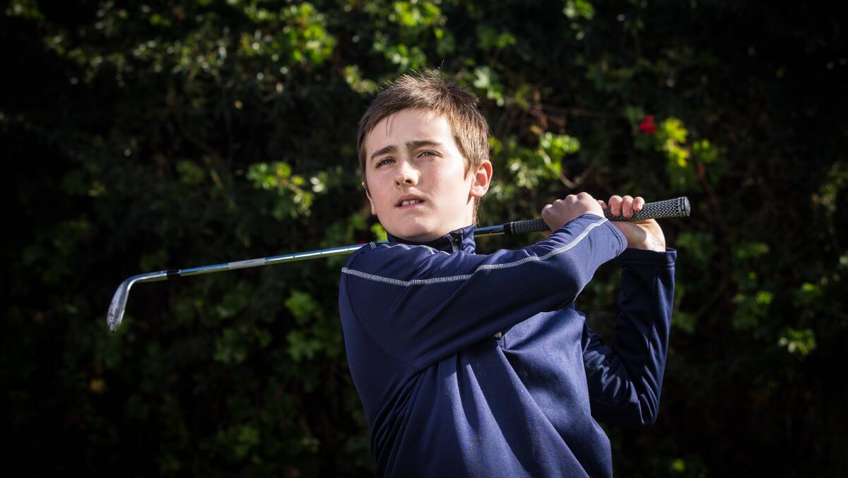 INSPIRED: Eric Smith is competing in the Sungold Junior Open on Monday. His father Paul was the reason the teenager got into playing golf. Picture: Christine Ansorge