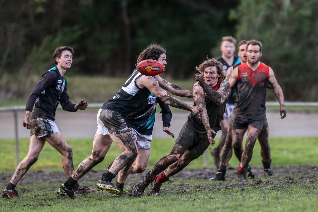Getting dirty: Timboon Demons midfielder Andrew Hargreaves was in and under the packs all day against the Power on Saturday. Picture: Christine Ansorge.