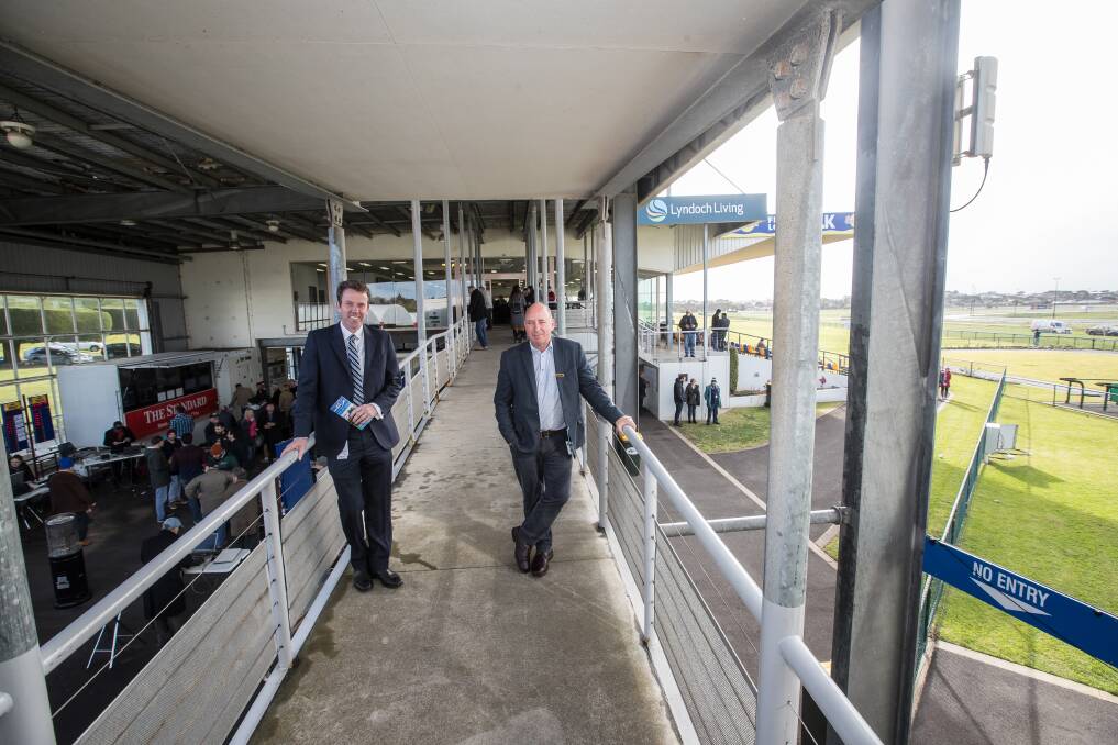 Room with a view: Dan Tehan and Nick Rule where the upgrade will be built. Picture: Christine Ansorge