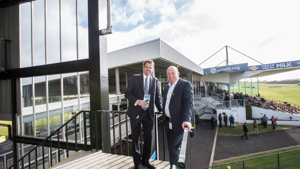 Federal Member for Wannon Dan Tehan, left, and Warrnambool Racing Club chairman Nick Rule at the announcement earlier this year of a $1.25 million grant from the Building Better Regions Fund to extend the racing club's Matilda Room.
