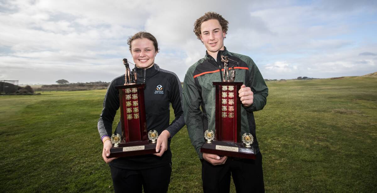 PLEASED: Georgia Fish and Noah Best pose with their trophies after winning the Alec Calvert Junior Open. Picture: Christine Ansorge
