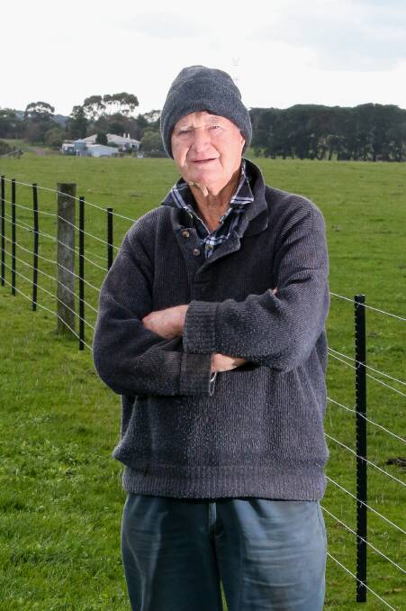 Against: Robert McCosh of Hawkesdale stands near the planned site for a wind turbine,  just over a kilometre from his house in the background. Picture: Morgan Hancock
