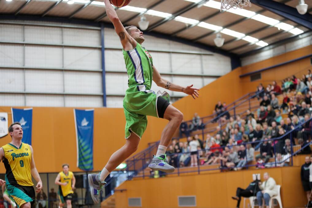 Air time: Nathan Sobey flies to the ring in his surprise appearance for the Warrnambool Seahawks on Sunday. Picture: Morgan Hancock