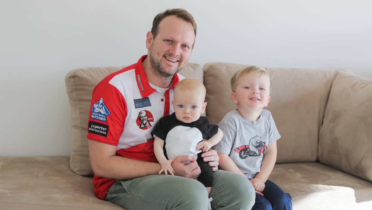 FAMILY TIME: Mat Buck with his sons, Hugo and Oscar, at his Koroit home during his time as South Warrnambool coach. Picture: Morgan Hancock