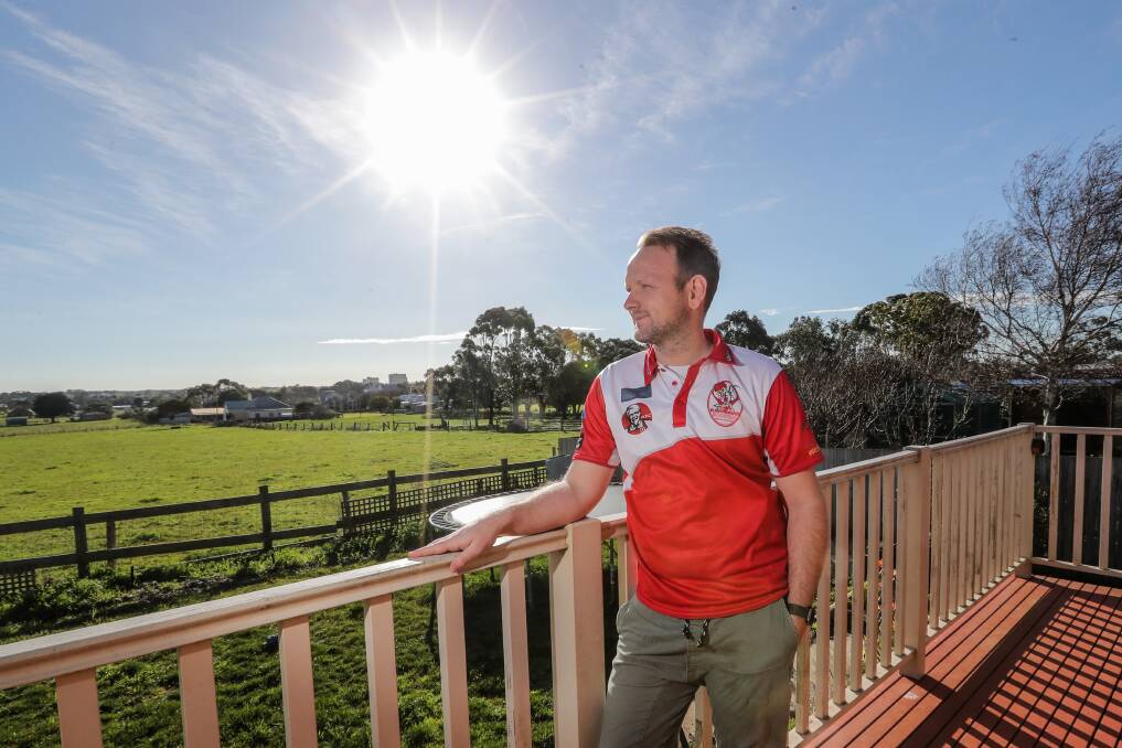 RELAX: South Warrnambool coach Mat Buck at his Koroit home. The third-year Roosters mentor spends countless hours preparing for Hampden league games each week. Picture: Morgan Hancock