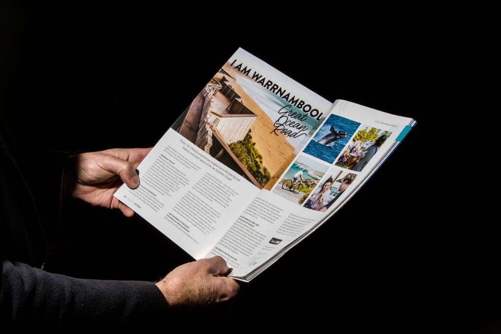 WOW: Warrnambool City councillor Tony Herbert holds the Destimations Victoria magazone, which features the city. The magazine has a readership of 5.7 million hotel guests annually. Picture: Morgan Hancock