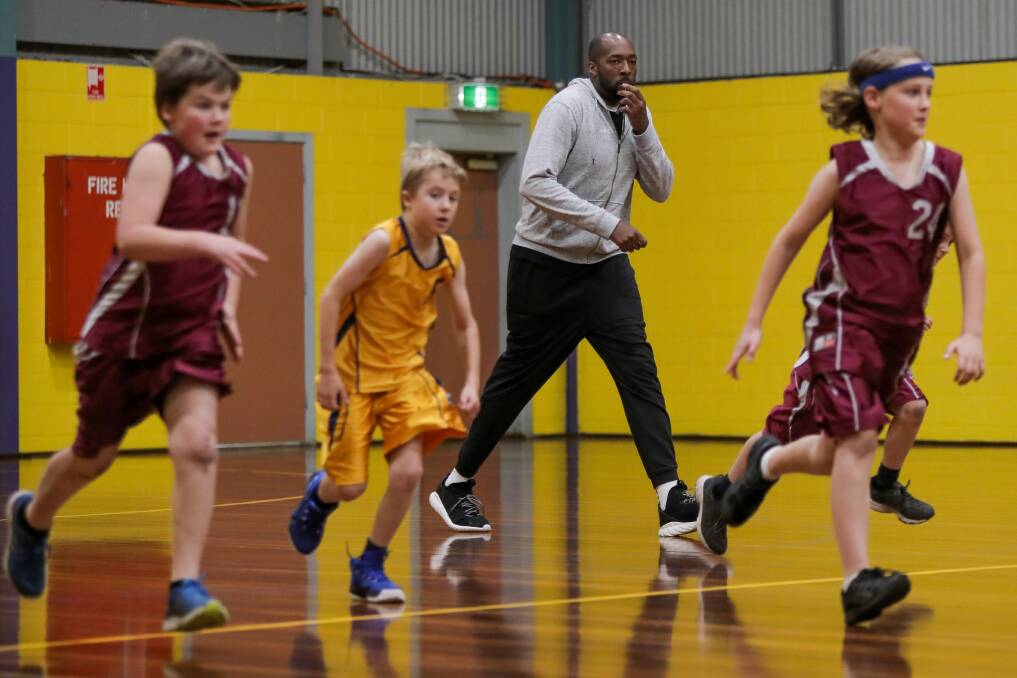 FOR THE LOVE OF THE GAME: Warrnambool Seahawks coach Tim Gainey teaching junior basketball players in Port Fairy. He wants to see the next generation enjoy the sport the sport too. Picture: Morgan Hancock