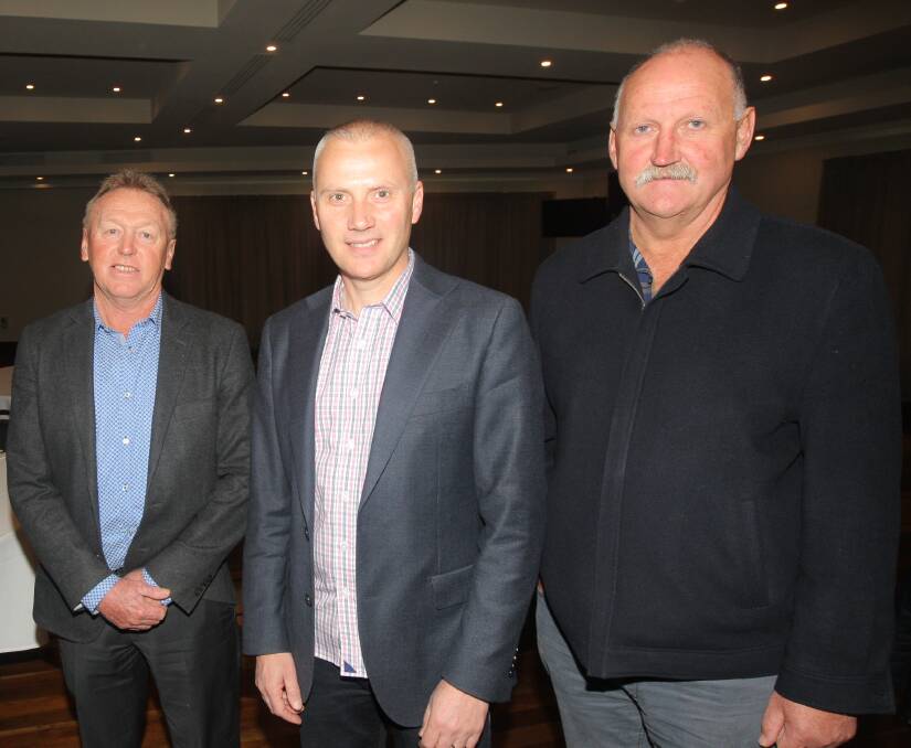 New approach: Fonterra Australia managing director Rene Dedoncker, centre, with Fonterra suppliers Tony Marwood and John Dalton.