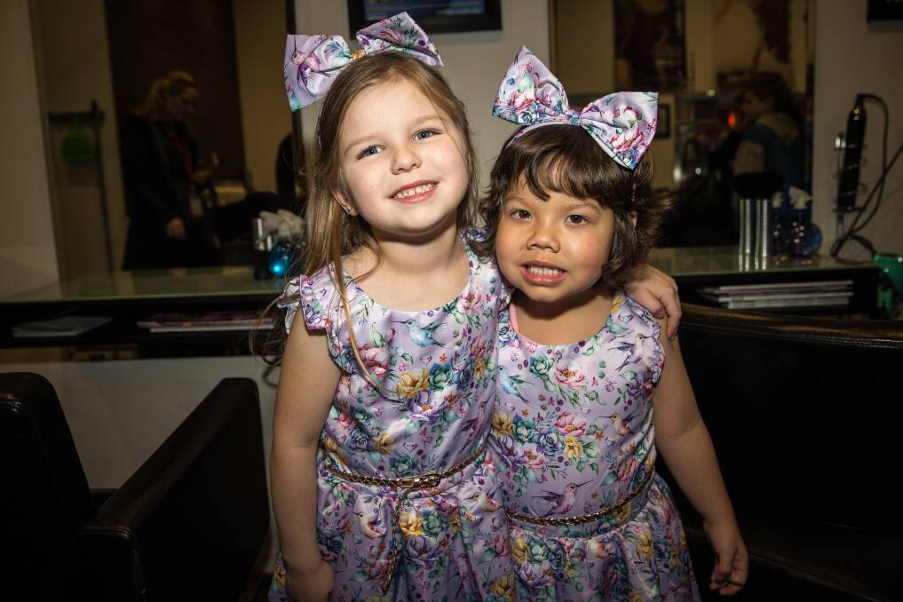 Besties: Lucy Perrett, 5, and Sophie Wallace, 4, shared their first haircut on Friday. Picture: Christine Ansorge