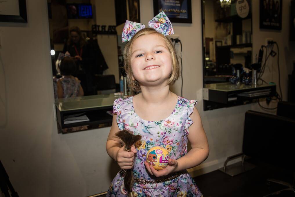 GENEROUS: Lucy Perrett, 5, grew her hair out for two years so she could cut it off and donate it to a charity that makes wigs for children with cancer and alopecia. Picture: Christine Ansorge