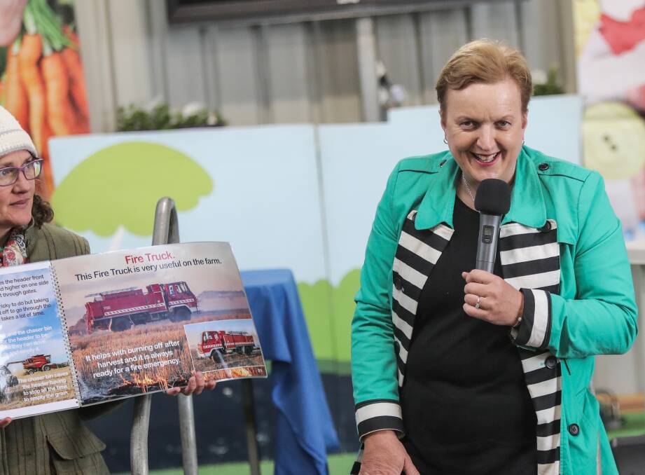 Picture this: Tracey Kruger reads from one of her children's book, "We Love the Farm Machines" at Sheepvention at Hamilton.  Picture: Morgan Hancock
