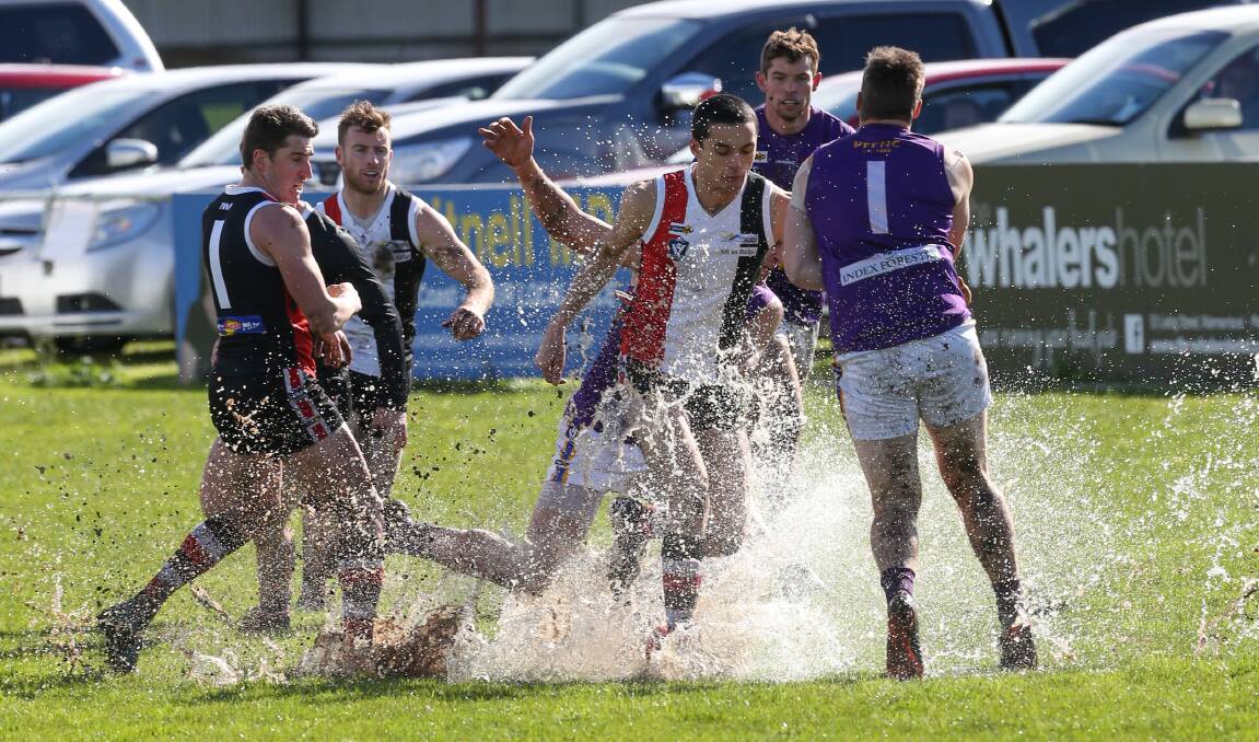 WATER WORLD: The wet conditions played a huge role in the Koroit and Port Fairy clash at Victoria Park on Saturday. Picture: Michael Chambers