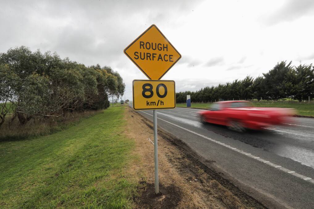 DROPPED DUE TO DAMAGE: Recommended 80km/h signs have appeared on the Princes Highway west of Warrnambool. VicRoads says it is working on a long-term plan for the road. Picture: Morgan Hancock