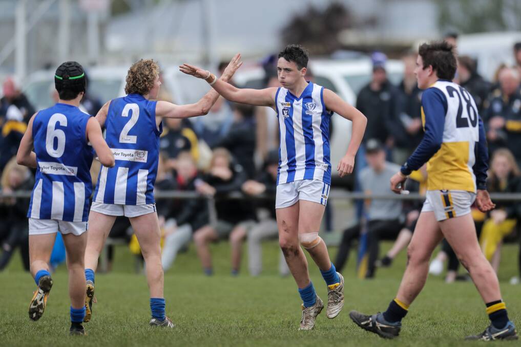 On song: Kieran Barker celebrates a goal in the Hampden league 2018 under 16s grand final between Hamilton Kangaroos and North Warrnambool Eagles. The Hamilton Kangaroos have made a successful transition to the Hampden juniors. Picture: Rob Gunstone