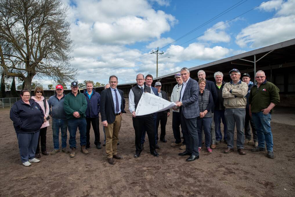 Member for Polwarth Richard Riordan, Terang Harness Racing Club president Evan Savage and Nationals Leader Peter Walsh with club members and supporters at the announcement. Picture: Christine Ansorge