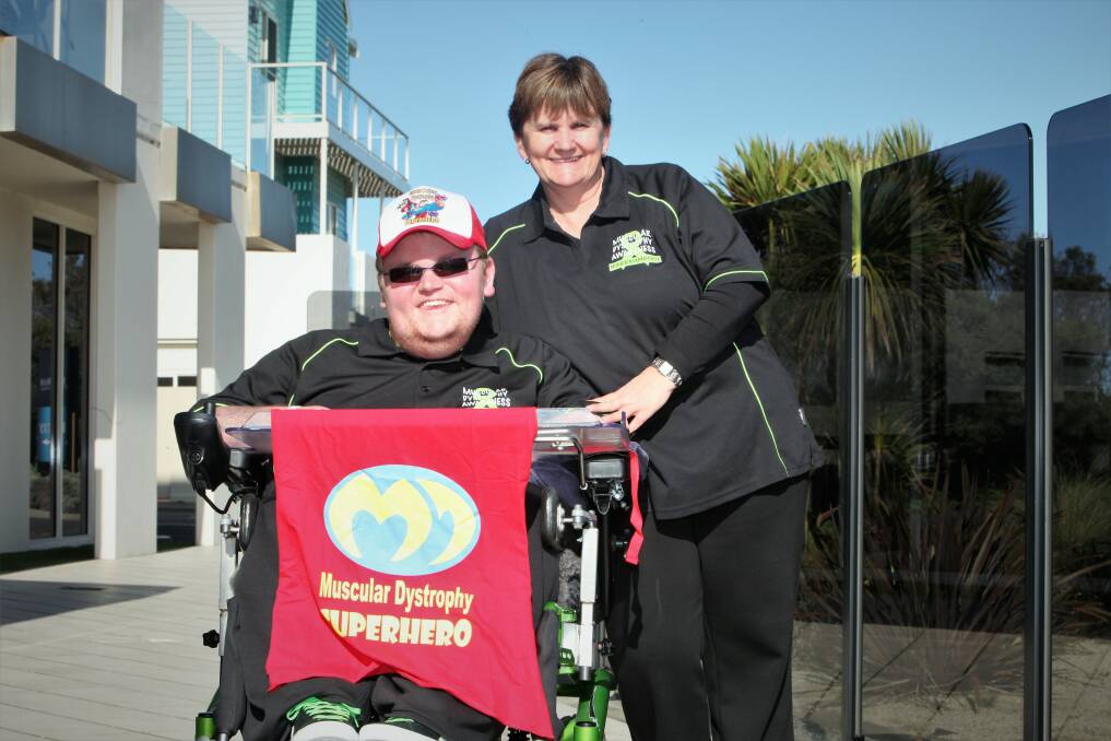 Caped crusader: Muscular Dystrophy Warrnambool's Chris Gillin (AKA Batman) and his mum Mandy Gillin are hosting a Superhero Concert at the Lady Bay Resort August 31. Picture: Anthony Brady 