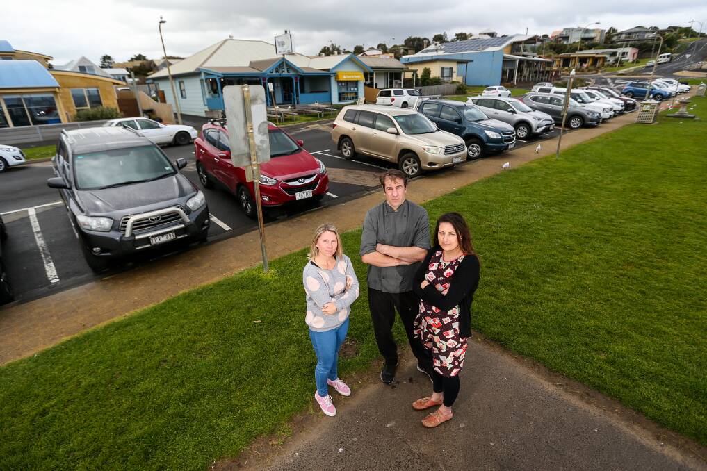 'If you take away the parking then you take away our business': Port Campbell resident Sharon Cotton with fellow residents and business owners Sam and Laura Anderson. Picture: Morgan Hancock .