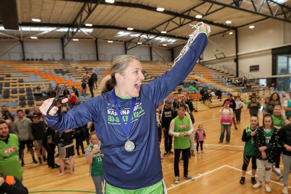WE'RE NUMBER ONE: Warrnambool Mermaids coach Louise Brown celebrates their 2018 division one championship. Picture: Morgan Hancock .