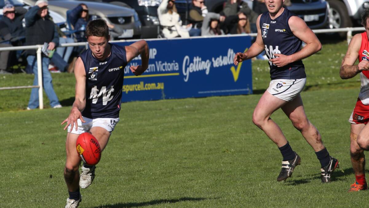 Out and running: Warrnambool's Mitch Burgess bounces against South Warrnambool. 