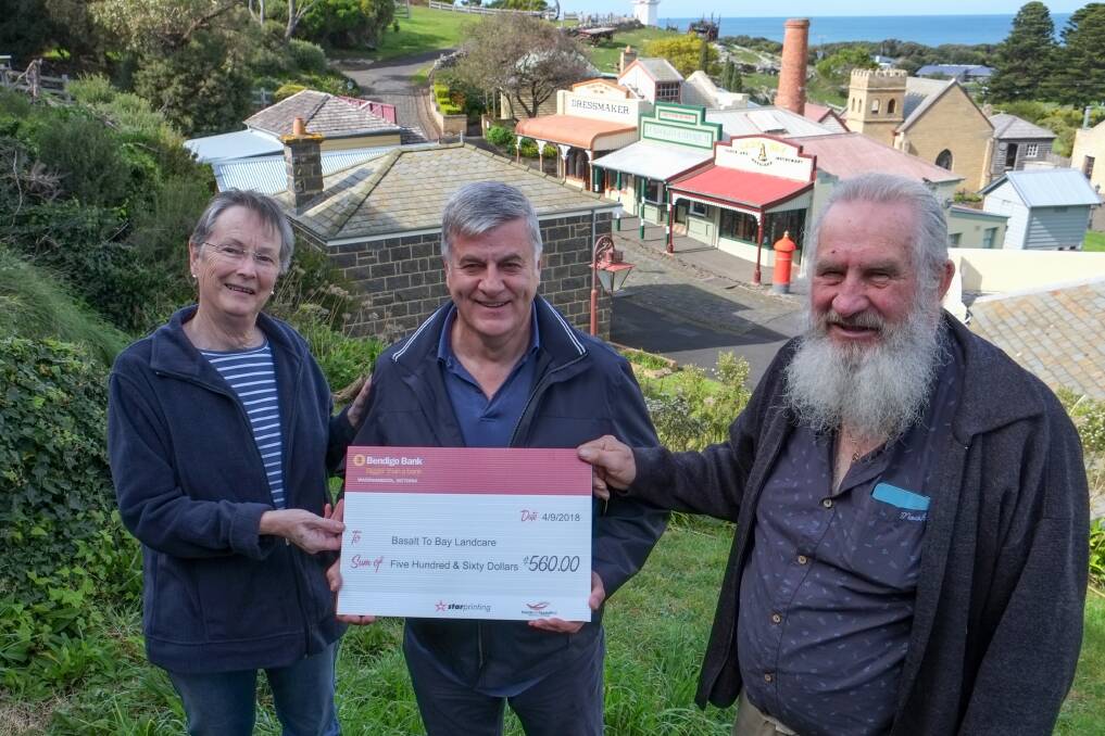 Help: Hawkesdale CWA's Cate Dickson, Basalt to Bay Landcare Network member Darrell Powell and Friends of Flagstaff Hill chairman Sean Cole. Picture: Rob Gunstone