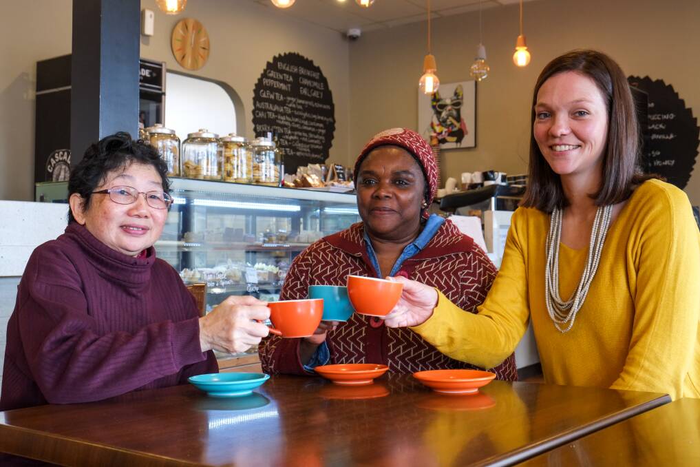 Coffee and a chat: Lynette Tung, Jeanne Mwikiza and Language Cafe organiser Carly Jordan catch up in Hamilton. Picture: Rob Gunstone