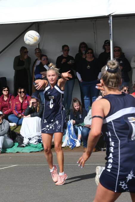 In full flight: Nirranda's Jo Couch dishes out a pass to a team mate in Saturday's grand final. Picture: Michael Chambers