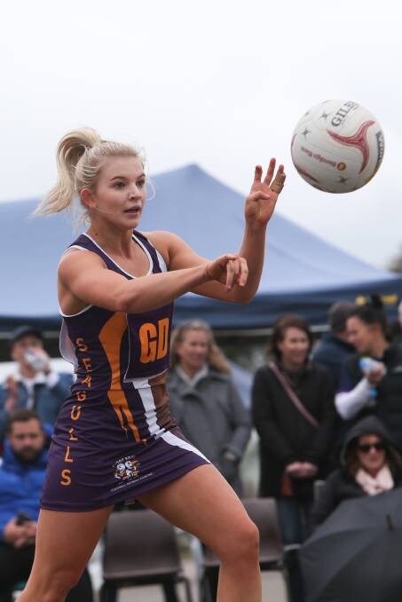 DYNAMIC DEFENDER: Port Fairy netballer Carly Watson lifted the Seagulls with her attack on the contest against North Warrnambool Eagles. Picture: Michael Chambers