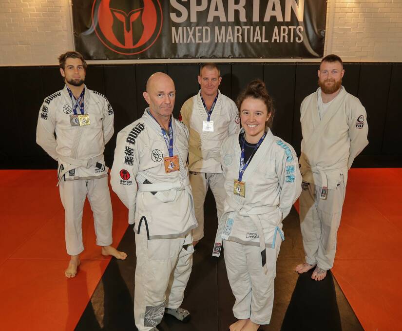 FIGHTING STRONG: Spartan MMA gym’s Aidan Berg, Chris Russell, Jo Rowland, Stephanie Umbers and Luke Rowland all competed in Melbourne. Picture: Morgan Hancock