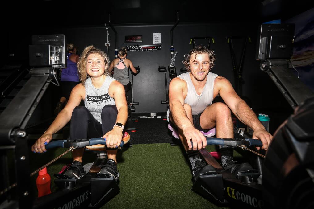 Still smiling: Raya Rantall and Jesse Arms about half way through their marathon rowing challenge raising money for Aussie Helpers. Picture: Christine Ansorge