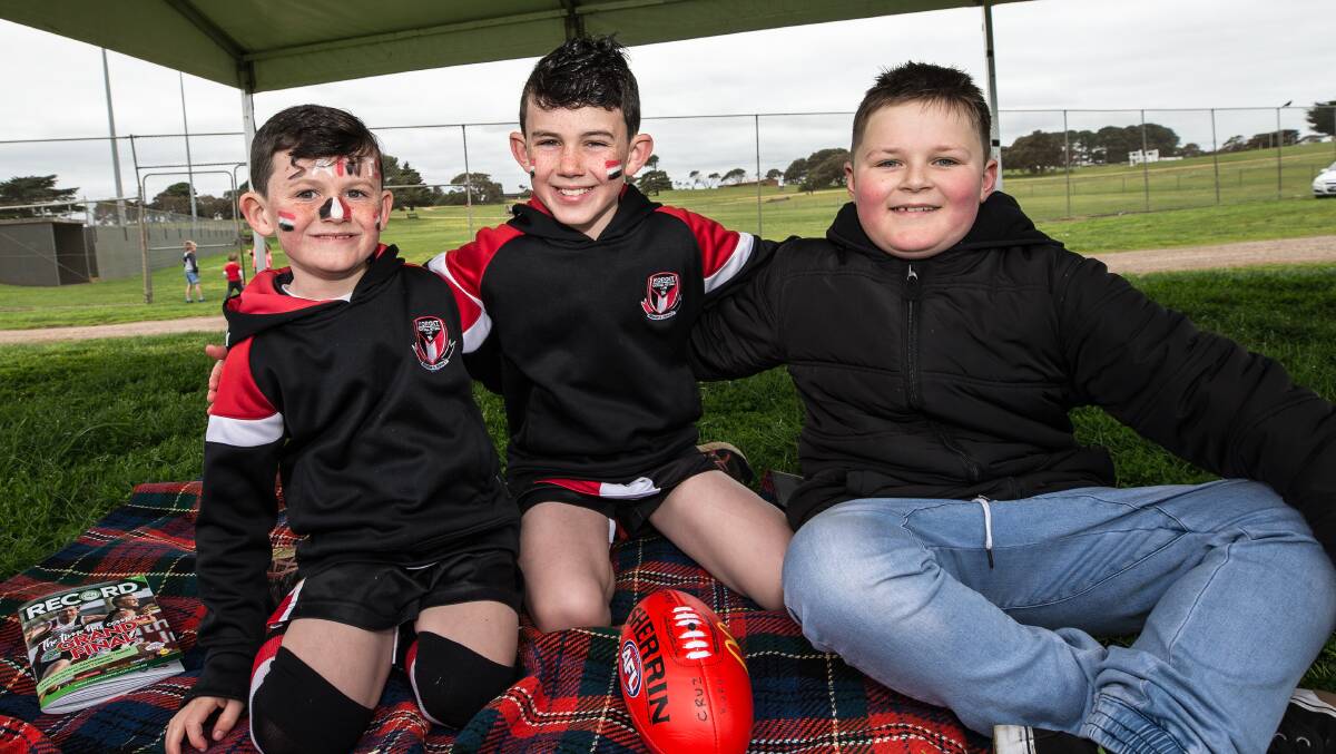 Excited: Tighe Perry, 7, Cruz Perry, 9, and Zavier Longmore, 9 enjoying themselves at the HFNL grand finals.  