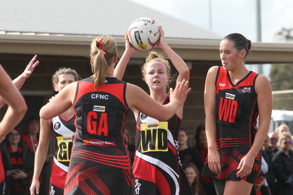 SAINT-SATIONAL: Koroit's Carly Pulling looking for a lead in the open netball grand final against Cobden. The Saints won back-to-back flags. Picture: Michael Chambers