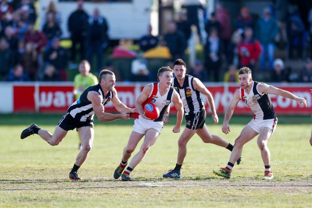 NEW CHALLENGE: Redland recruit Blair McCutcheon, pictured playing for Koroit in the 2018 Hampden league grand final, is excited about the prospect of playing at the GABBA and Metricon Stadium. Picture: Morgan Hancock
