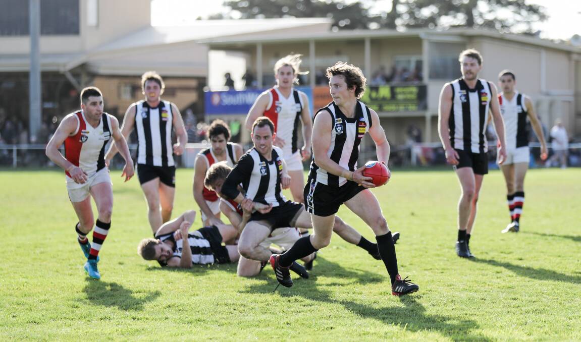 SMOOTH-MOVER: Camperdown's Cameron Spence, pictured playing in the 2018 Hampden league grand final, hopes to use his long kicking and run and carry to advantage at new club Redland in 2019. Picture: Morgan Hancock